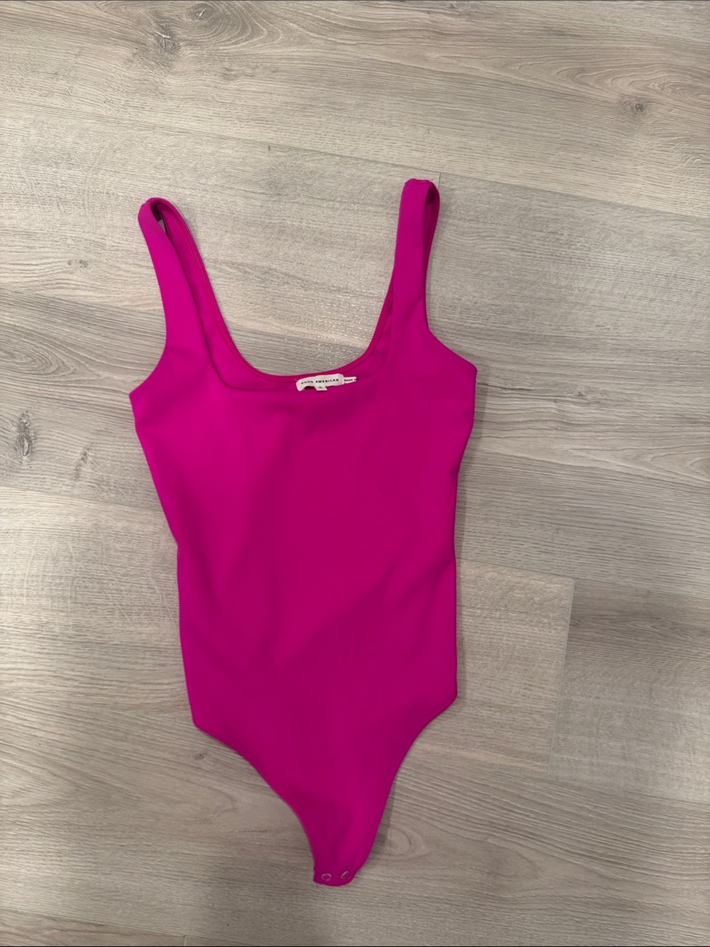 Women’s Fuchsia One-Piece bodysuit